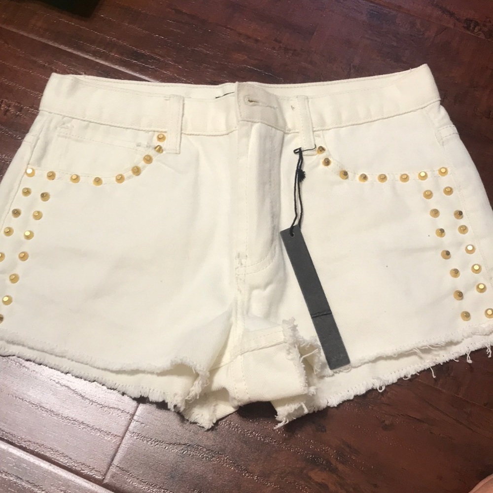 High waisted white studded shorts